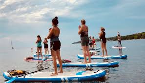 Stand Up Paddleboard Yoga & SUP Lessons